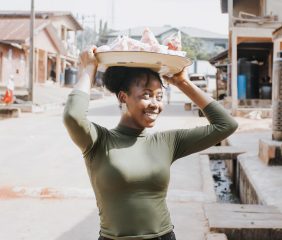 medium-shot-woman-carrying-food